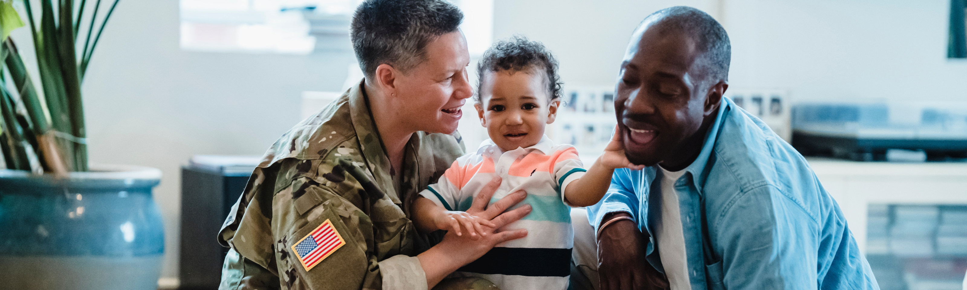 Military family at home with baby